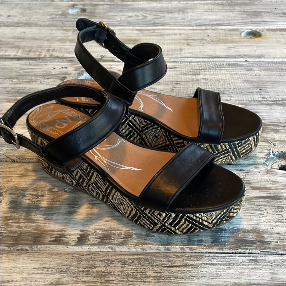 In excellent condition, Dolce Vita black platform sandals, size 9